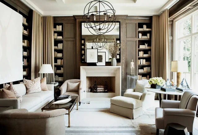 Tailored interior with built-in shelves and a patterned feature wall